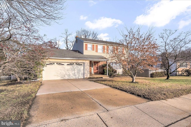 view of property featuring a garage and a front lawn