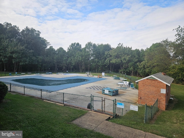 LOT24 Bay Pointe Dr, Montross, VA 22520 - community pool featuring a patio area, a gate, and a view of trees