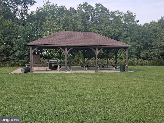 view of community with a gazebo and a lawn