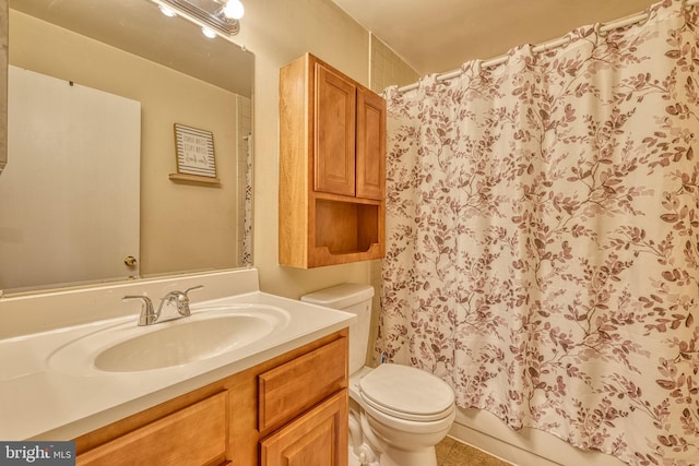 full bathroom featuring shower / bath combination with curtain, vanity, and toilet