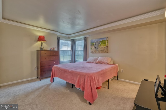 carpeted bedroom featuring crown molding