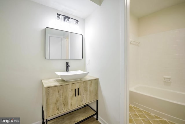 bathroom featuring vanity and bathtub / shower combination