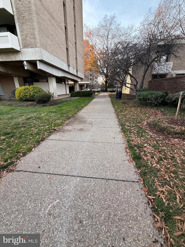 surrounding community featuring a lawn