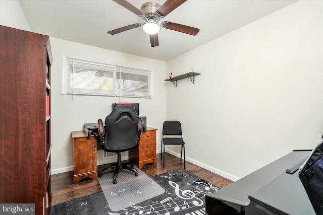 office space featuring ceiling fan and dark wood-type flooring