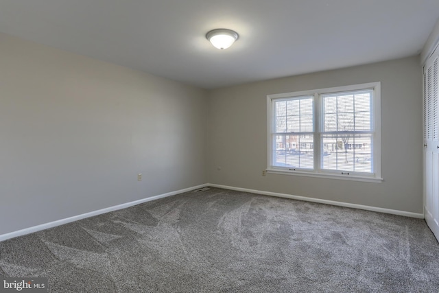 spare room with carpet flooring