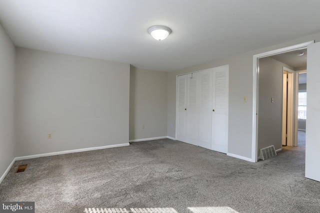 unfurnished bedroom featuring carpet