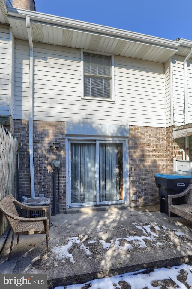 back of house with a patio