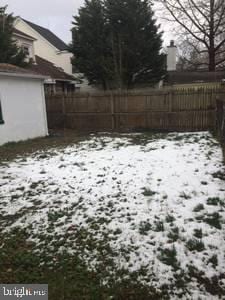 view of yard covered in snow