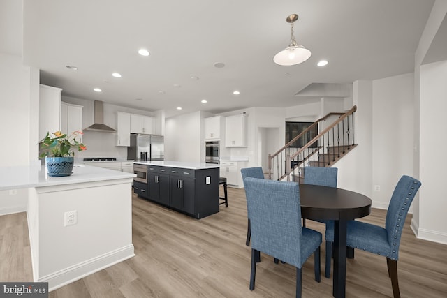 dining room with light hardwood / wood-style floors