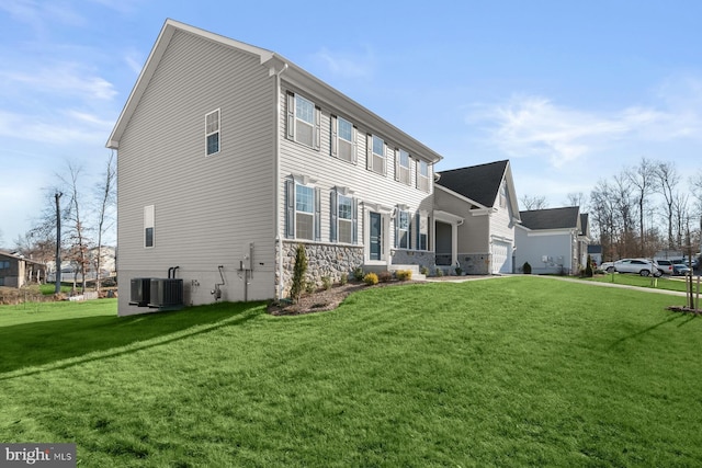 view of property exterior featuring cooling unit and a yard