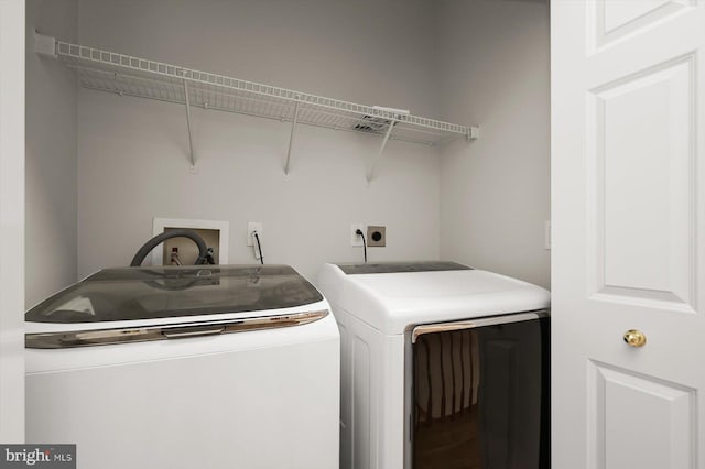 laundry room featuring independent washer and dryer