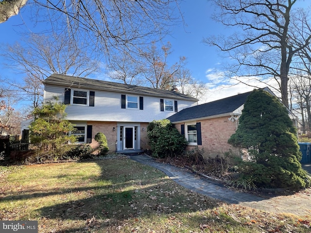 view of front of property with a front lawn