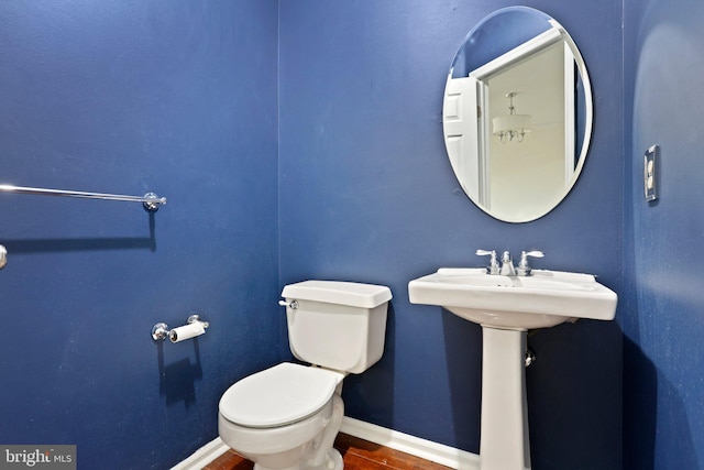 bathroom featuring toilet