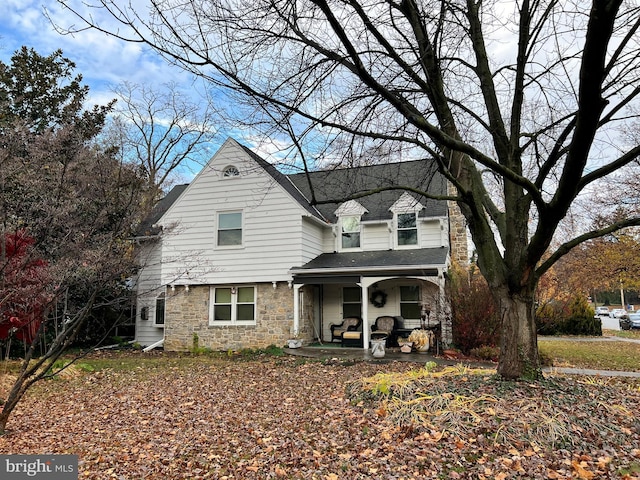 view of property with a porch