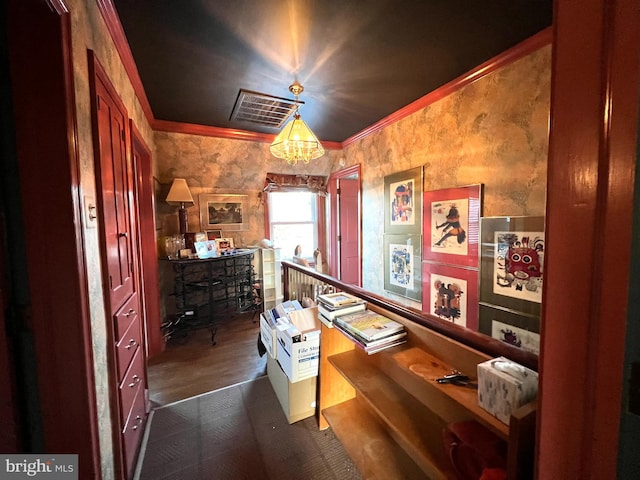 rec room with ornamental molding and dark wood-type flooring