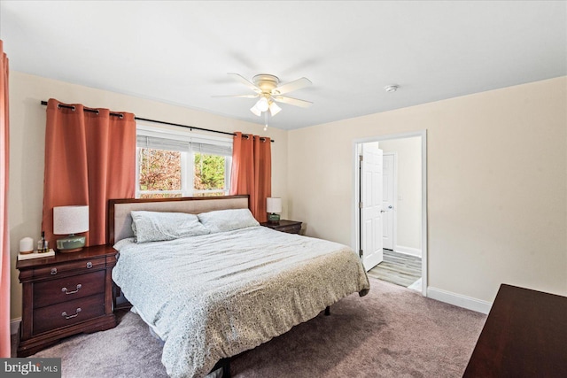 bedroom with ceiling fan and light colored carpet