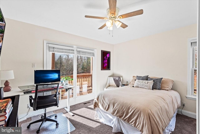 bedroom featuring access to exterior, ceiling fan, and carpet