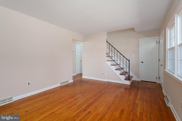 interior space with hardwood / wood-style flooring