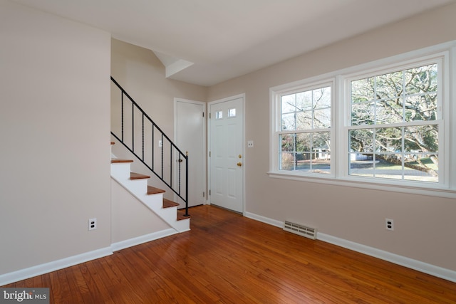 entrance foyer featuring wood-type flooring