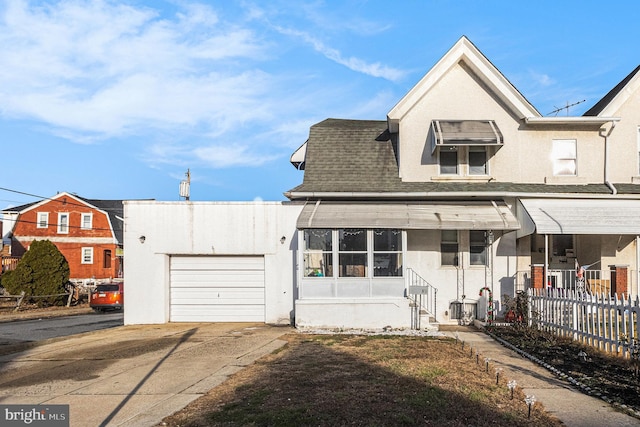 view of front of home featuring a garage