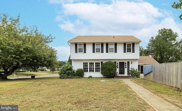 view of front of property with a front lawn