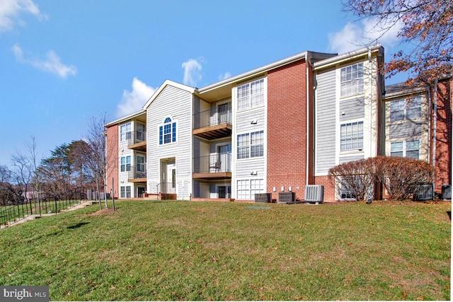 view of property featuring central AC unit