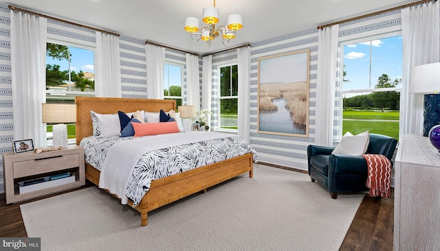 bedroom with an inviting chandelier