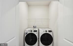 laundry area featuring washer and clothes dryer