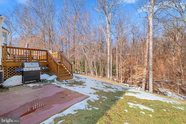 view of yard featuring cooling unit and a wooden deck