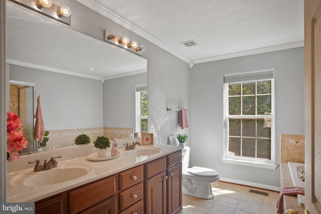 bathroom featuring tile patterned floors, crown molding, a textured ceiling, and a wealth of natural light