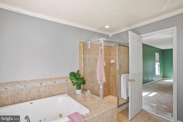 bathroom with tile patterned flooring, ornamental molding, and shower with separate bathtub