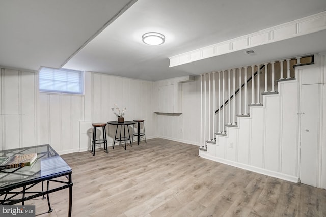 basement with light wood-type flooring