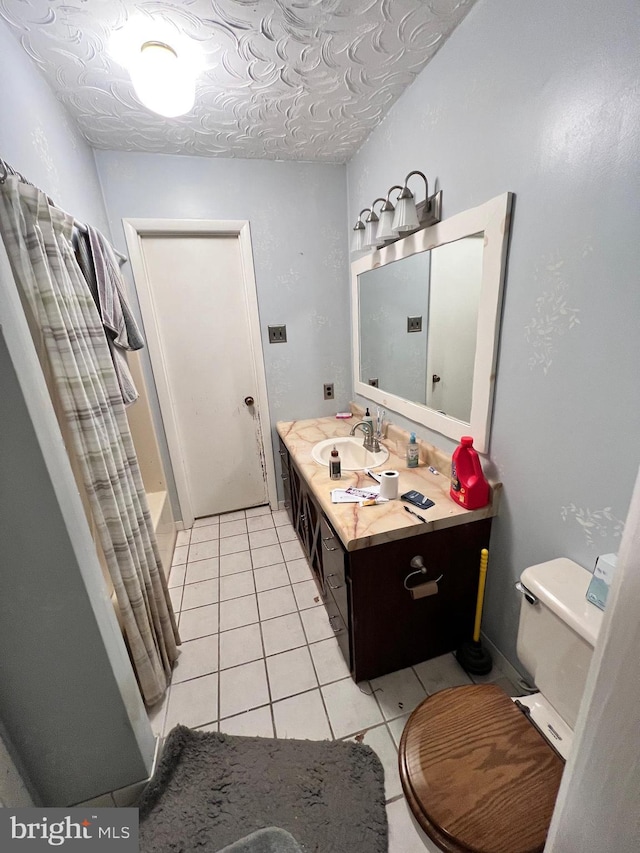 full bathroom featuring tile patterned flooring, vanity, shower / bath combination with curtain, and toilet