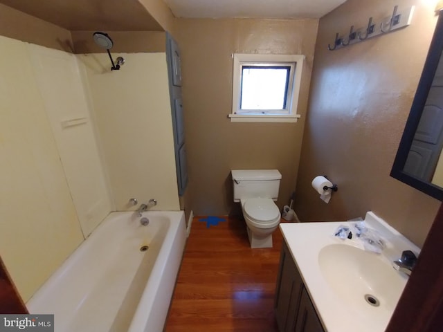 full bathroom featuring shower / tub combination, hardwood / wood-style floors, vanity, and toilet