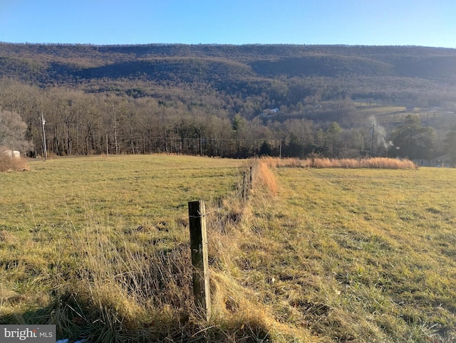 exterior space with a rural view