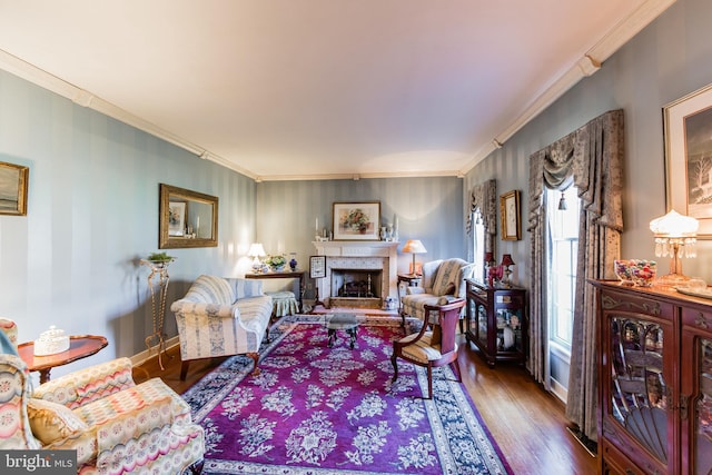 living room featuring crown molding and wood-type flooring