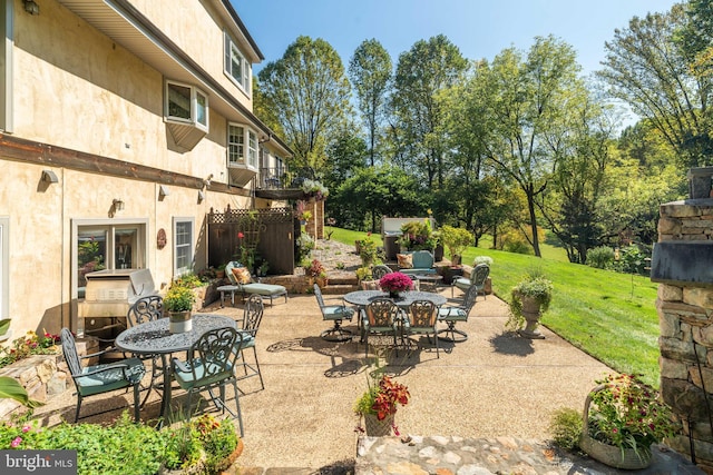 view of patio with a grill