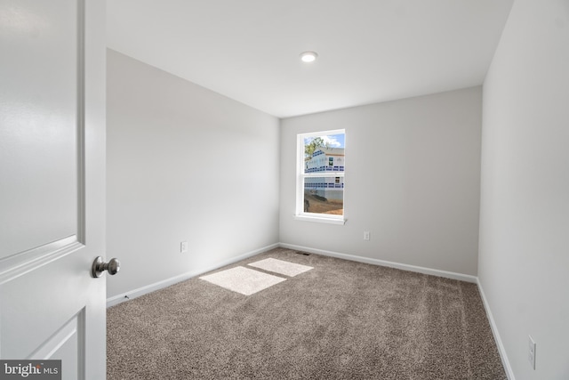 view of carpeted empty room