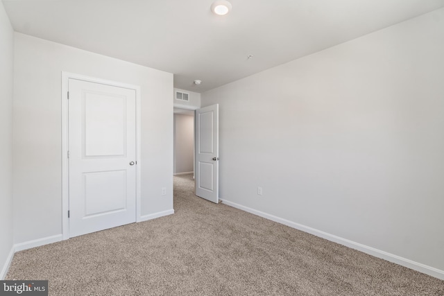 unfurnished bedroom featuring carpet flooring