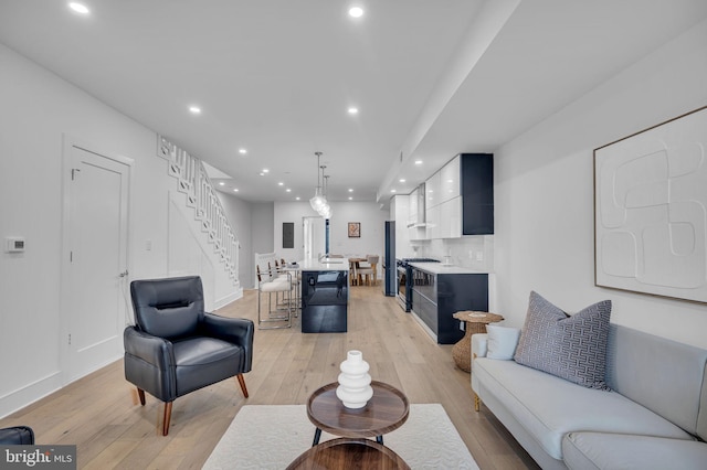 living room featuring light hardwood / wood-style flooring