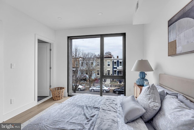 bedroom featuring hardwood / wood-style flooring