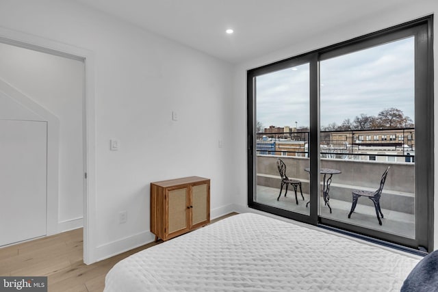 bedroom with light wood-type flooring