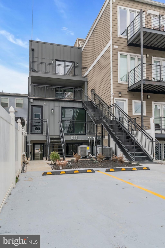 view of property featuring central AC unit