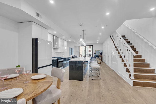 dining area featuring light hardwood / wood-style flooring