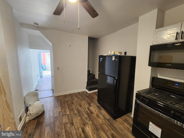 kitchen featuring ceiling fan, dark wood-type flooring, and black appliances