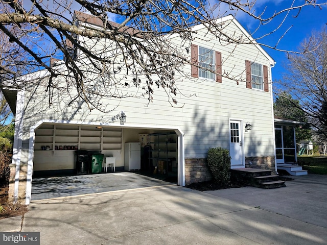 view of front of property with a garage