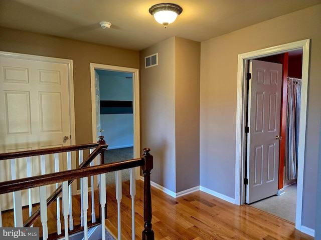 hallway featuring light wood-type flooring