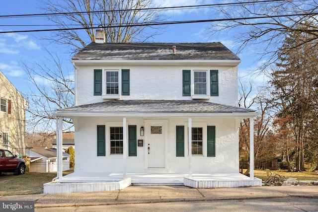 37 Central Ave, Spring City, PA 19475 - view of front of property with covered porch, a chimney, and stucco siding