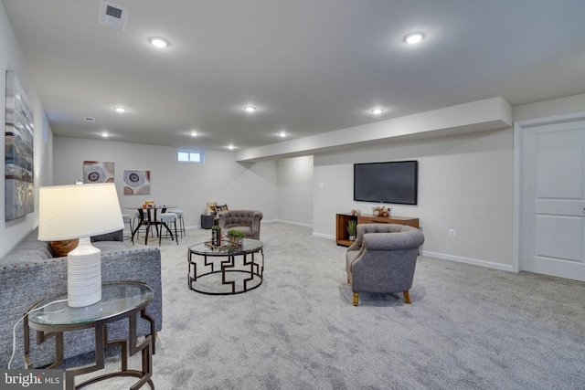 living room featuring light colored carpet