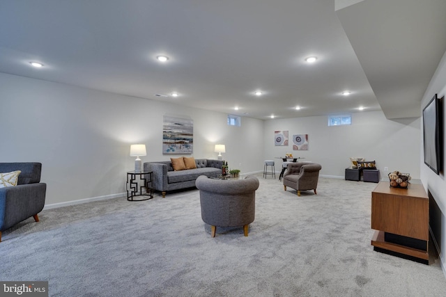 living room featuring light carpet